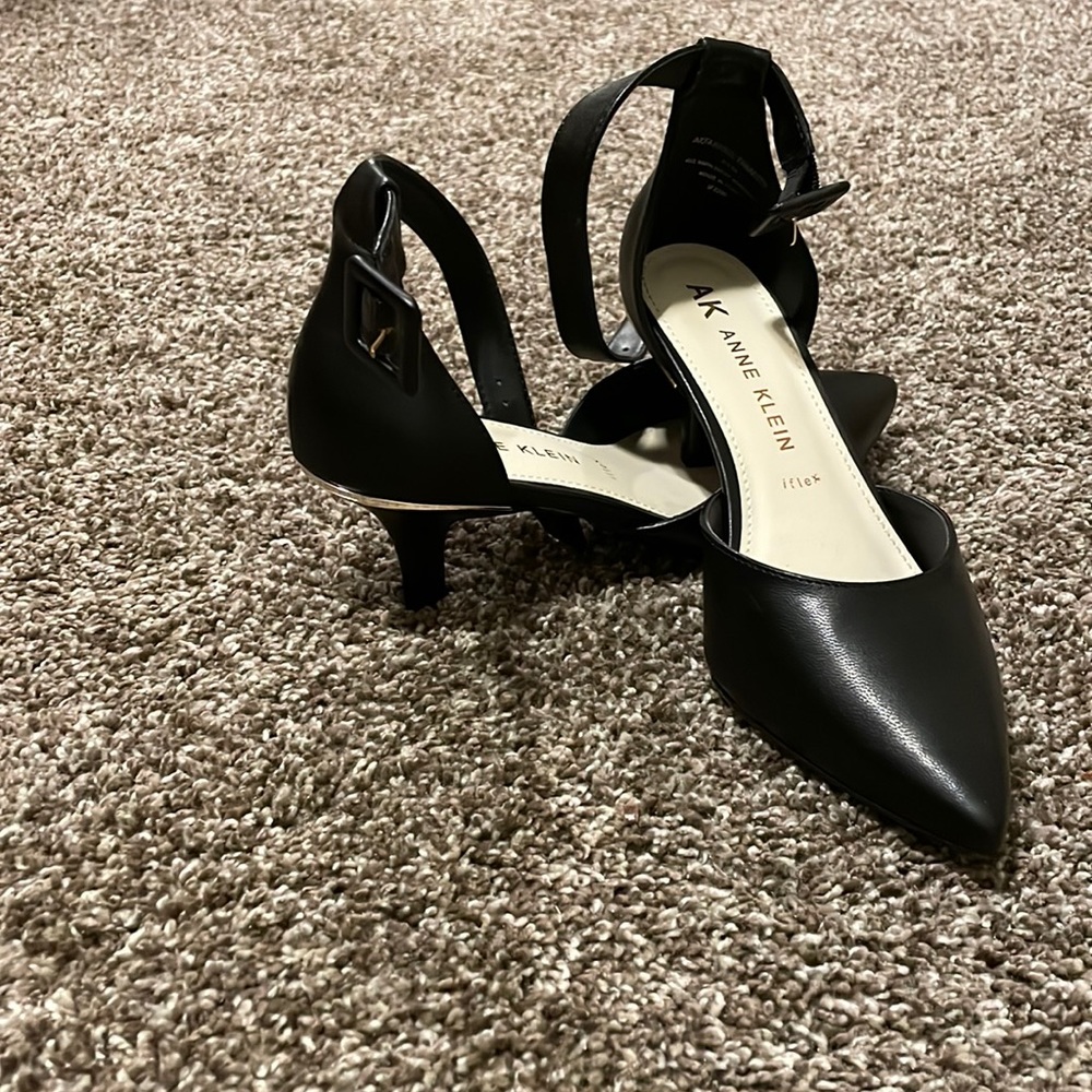 Black heel with strap